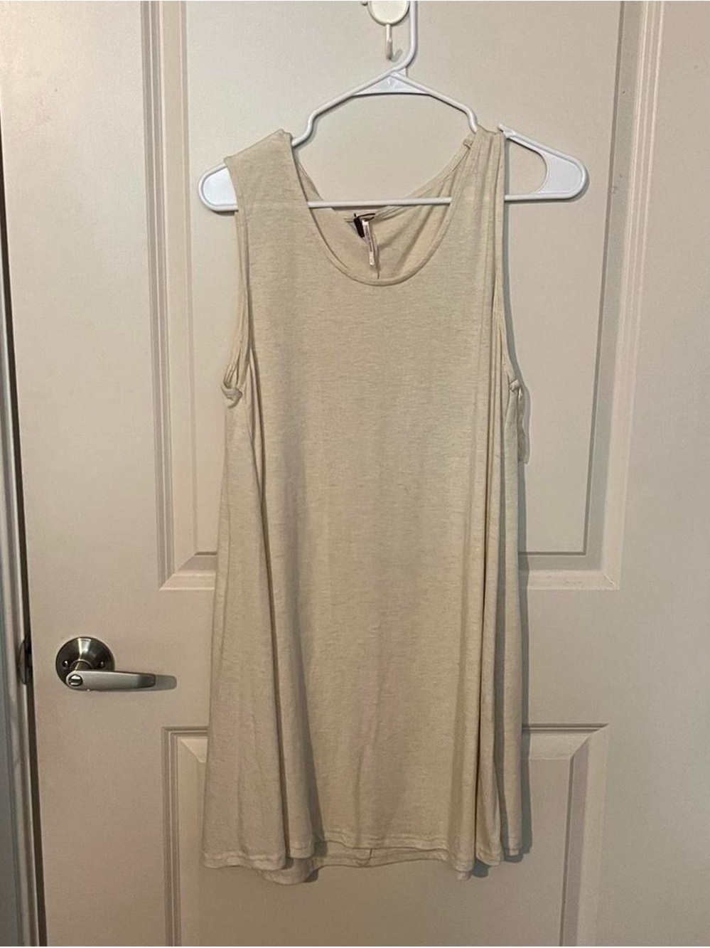 Sleeveless Cream Swing Tank Top